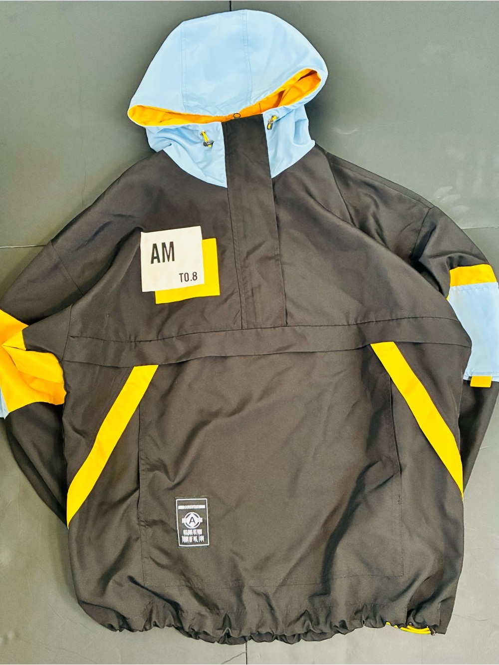 Gurunvani Black Windbreaker Jacket with Blue Hood and Yellow Trim